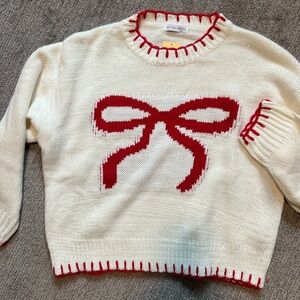 red bow sweater